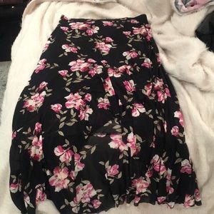 Mid length floral skirt with ruffle detailing